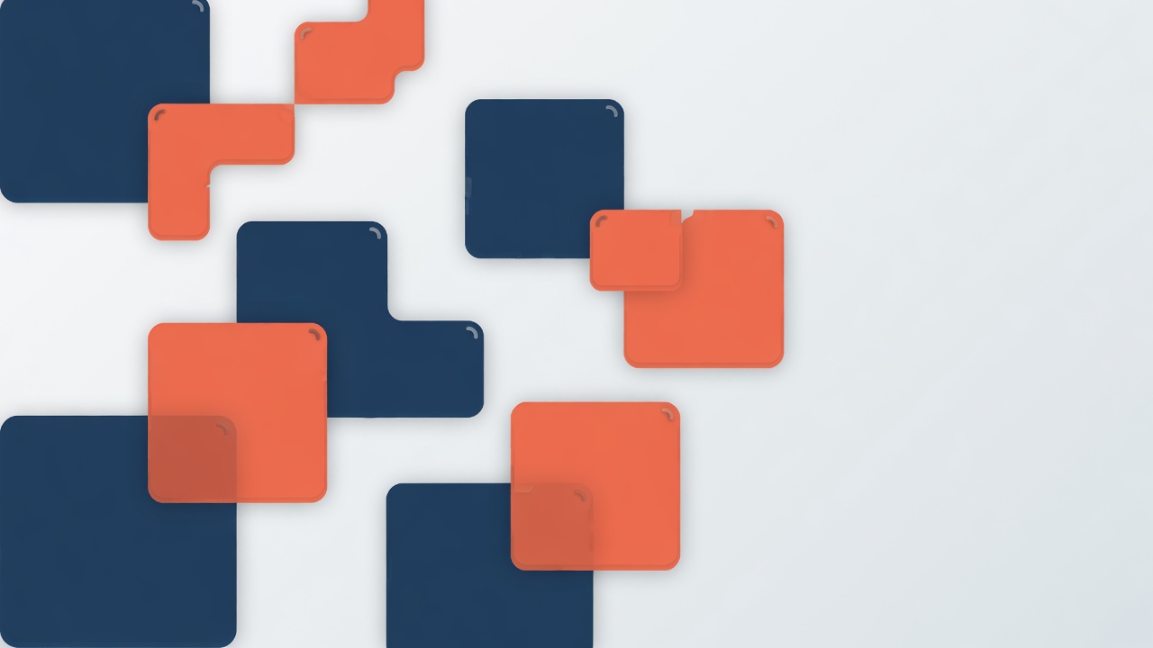 Abstract geometric modules in navy and orange, representing modular enterprise systems architecture
